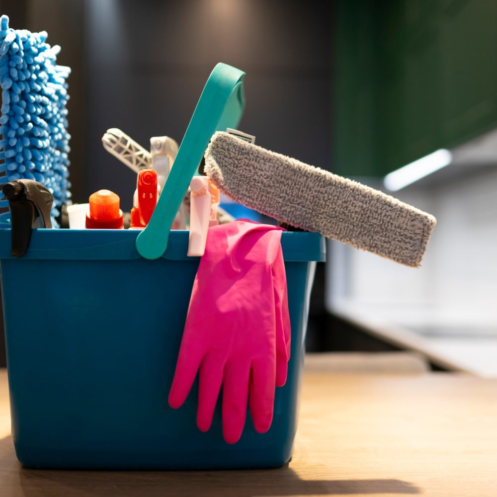 Professional cleaning bucket with accessories. Bucket full of cleaning products Professional cleaning bucket with accessories. Bucket full of cleaning products
